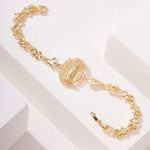 Brazalete dorado de la Virgen María con detalles florales