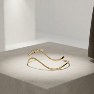 Brazalete para brazo curvo